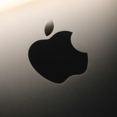 Apple and OpenAI logos on background
