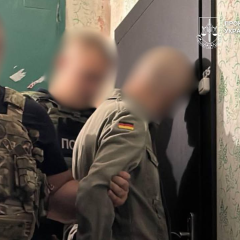 Чоловік з рушницею у Києві