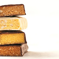 Коли краще їсти протеїнові батончики:  до чи після тренування?