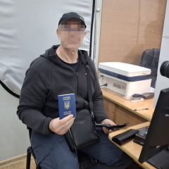 Former POW receives passport after 7 years