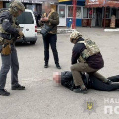 Автомобиль полиции во время инсценировки нападения