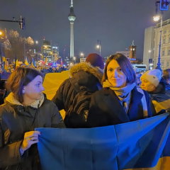 Ukrainian flag against the backdrop of world landmarks