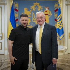 Trump and Zelensky in the background