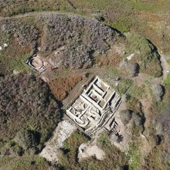 Iron Age wall under Roman settlement