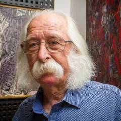 Ivan Marchuk reflects in the institute corridor
