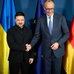 Flags of Germany and Ukraine on money