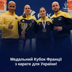 Three Ukrainian karatekas with medals