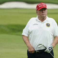 Trump rides in an armored golf cart