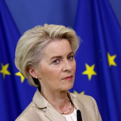 Ukrainian and European flags in the background