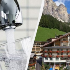 Hotel room with a glass of water