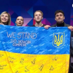 Flag with signatures of Ukrainian soldiers