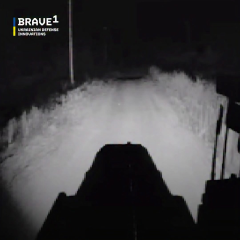 Drone tractor moving along the road