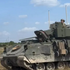 The US Army experiments with transporting FireAnt robots on Bradley