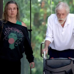 100-year-old Hollywood star and young wife on a walk