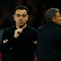 He holds hands with Xavi
