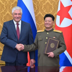 Russian and Korean flags at the meeting
