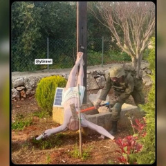 Image of damaged statue of Christ in Lebanon