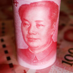 Китайський юань і американський долар на вазі світової війни