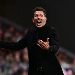Diego Simeone on the field during the match
