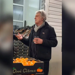Victor Yushchenko buying tangerines at the market