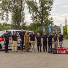 Rescuers with upgraded ambulance