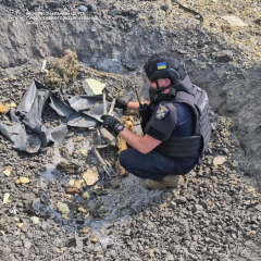 Rescuers remove remnants of the missile
