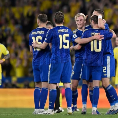 Swedish flag with victory in background