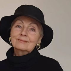 Antonina Marenich celebrating 77 years in a hat