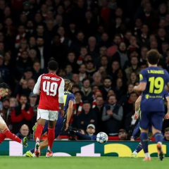 Atletico and Arsenal logos on background