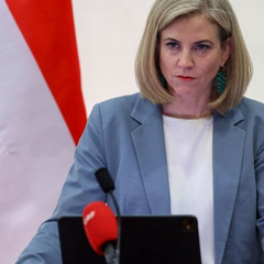 NATO flag against the background of the Austrian flag