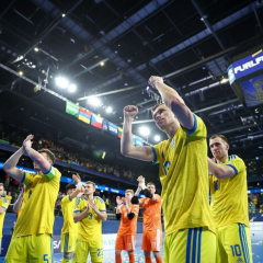 Ukrainian futsal players celebrating victory in the game