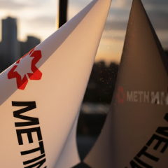 Metinvest logo. 18.7 billion UAH taxes