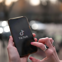 Meta and TikTok logos on porn background
