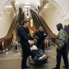 Police input data into ERDR at metro station