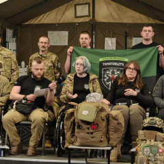 Volunteer battalion behind the fence