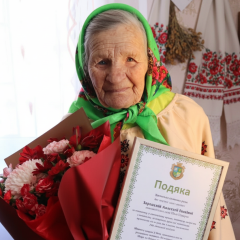 100-year-old woman in the garden in Ternopil region