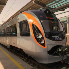Passengers transfer to a train in Poltava