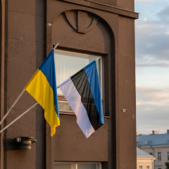 Flag of Estonia and map of Narva