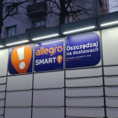 Allegro logo on the background of the Ukrainian flag