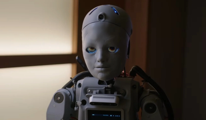 Robot-humanoid Codey communicating with children