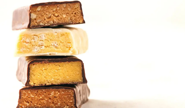 Коли краще їсти протеїнові батончики:  до чи після тренування?