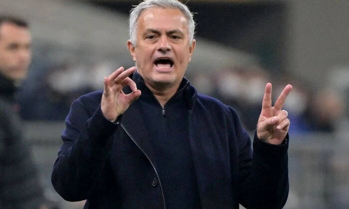 Mourinho and Vinicius on the field