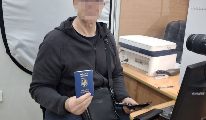 Former POW receives passport after 7 years