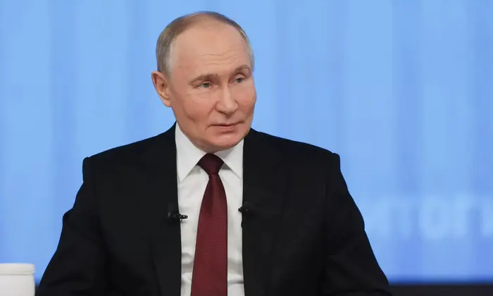 Зображення Путіна з підписом