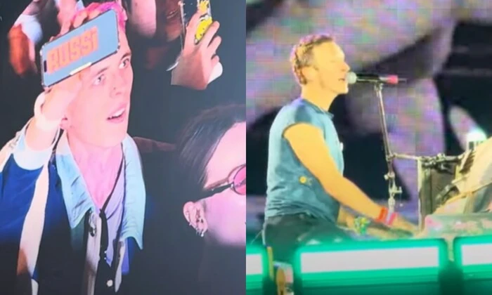 Coldplay выступает на сцене с украинским флагом