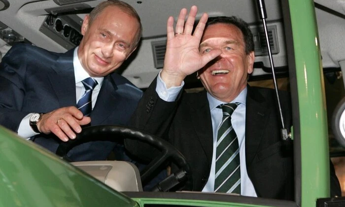 Putin and Schroeder make deal in Moscow