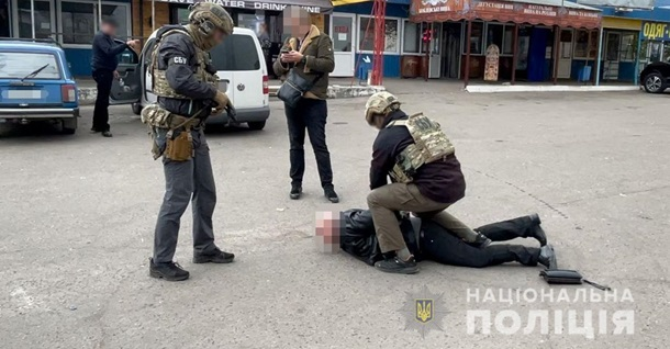 Автомобіль поліції під час інсценування нападу