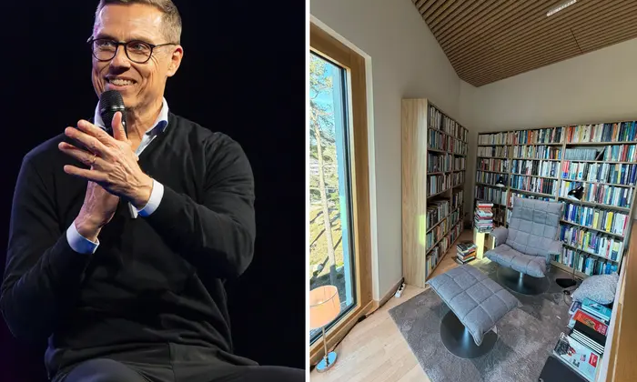President of Finland in reading room with book 'Wolf on Equality'