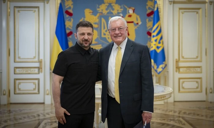 Trump and Zelensky in the background