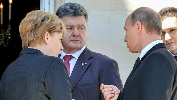 Путін і Порошенко зустрілися та поговорили в Нормандії